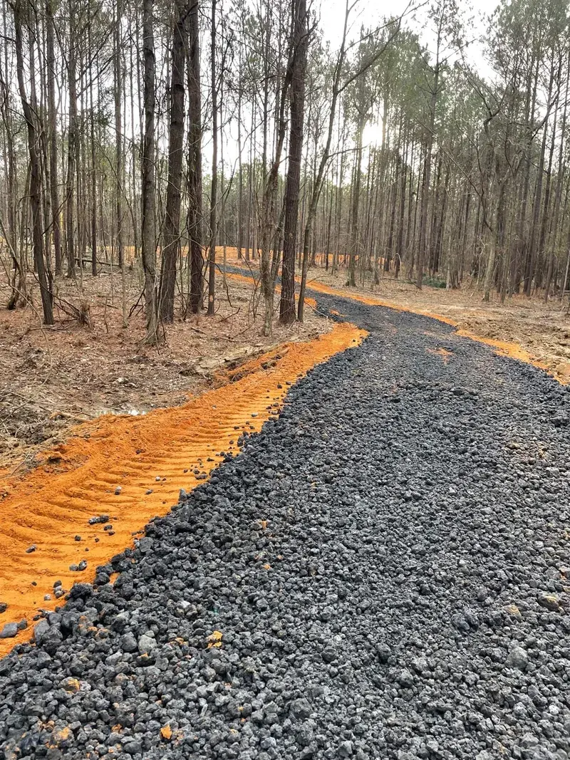 Heavy excavation equipment at commercial site preparation project in Mississippi